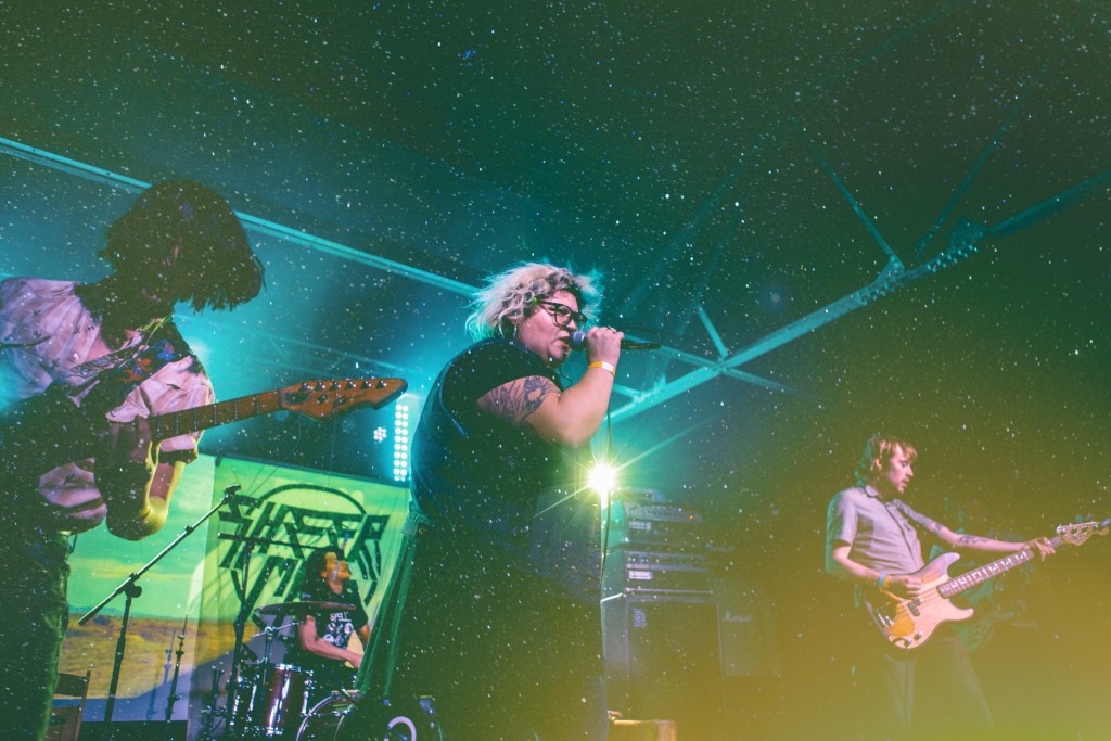 A double exposure of Sheer Mag and Marfa's night sky as seen from El Cosmico; photo by Bryan C. Parker